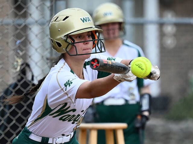 130551276_web1_WA-HR-Sfbl-1
Warrior Renee Haddock (27) attempts to lay down a bunt to advance the runner on first base against Holy Redeemer Thursday evening.
Tony Callaio | For Sunday Dispatch