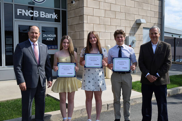 130805556_web1_Scholarship-2024-Photo--1
From left: Jerry Champi, FNCB Bank president and chief executive officer; Katherine Potter, Wyoming Area High School.; Kaylee Whiteford, North Pocono High School; Symeon Clark, Gregory the Great Academy; Michael Cummings, FNCB Bank senior vice president, marketing manager and foundation chairman.
Submitted Photo