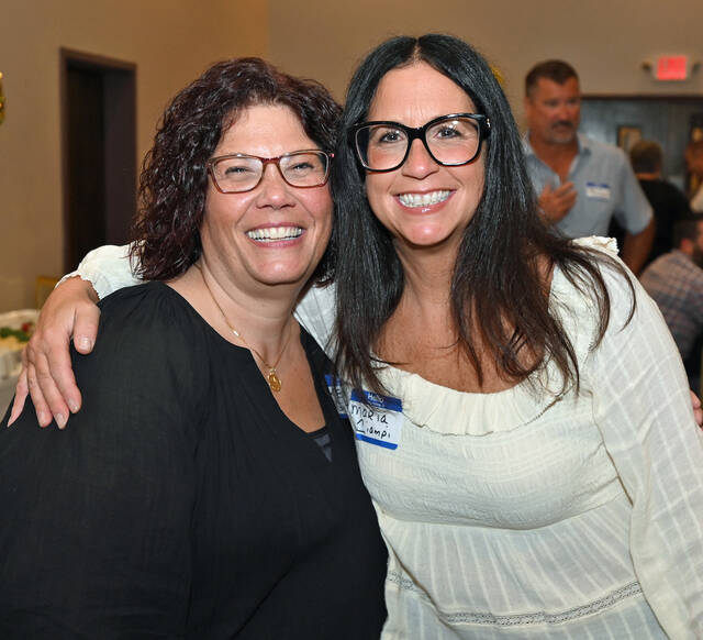 130892425_web1_WA-Class-of-89-35th-5
Keri Ann Gitkos Vermac, left, and Maria Ciampi, members of the reunion committee, take time out to pose for a photo at their 35th class reunion of Wyoming Area Class of 1989 at the Wyoming Hose Company Hall.
Tony Callaio | For Sunday Dispatch