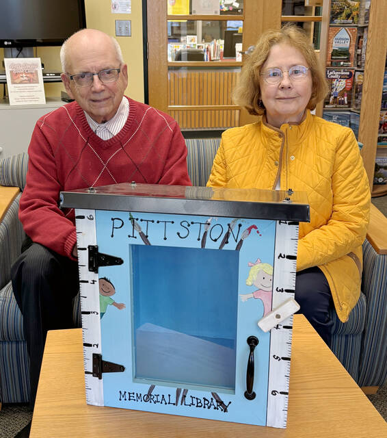 130981000_web1_PML-Mini-Lib-Boxes-1
Howard Grossman, former Pittston Memorial Library fundraiser, and Lois Ostrowski, library board member, sit behind a mini library box to be placed in City of Pittston. As many as 10 boxes will be available for use in the city.
Tony Callaio | For Sunday Dispatch