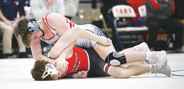 131252927_web1_PA-Haz-152-Wrestling
At 152 pounds, Pittston Areas Chase Baron (top) pinned his Hazleton Area opponent Logan Pop with less than a second left in the first period.
Tony Callaio | For Times Leader