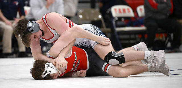 131259646_web1_PA-Haz-152-Wrestling
At 152, Pittston Areas Chase Baron (top) pinned his Hazleton Area opponent Logan Pop with less than a second in the first period.
Tony Callaio | For Times Leader