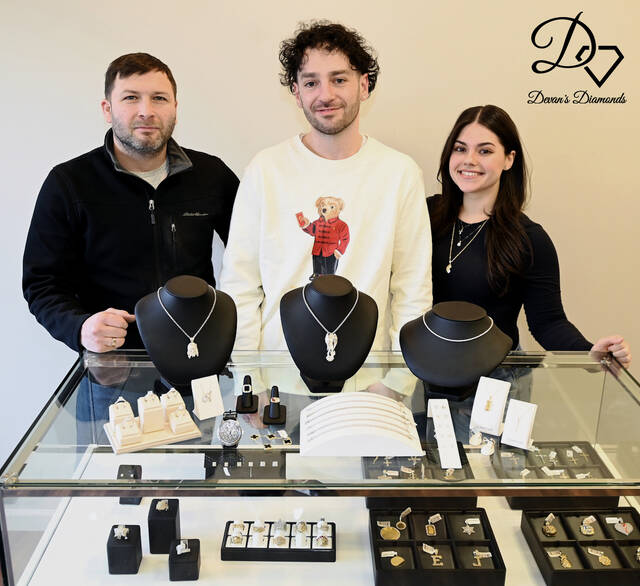 131259657_web1_Devan-s-Diamonds-1
The Devans Diamonds team, left to right: artist Slav Tretiakov; owner/designer Mike Caruso; staff Kristina Taddei. Jaclyn Savage is also a staff member.
Tony Callaio | For Sunday Dispatch