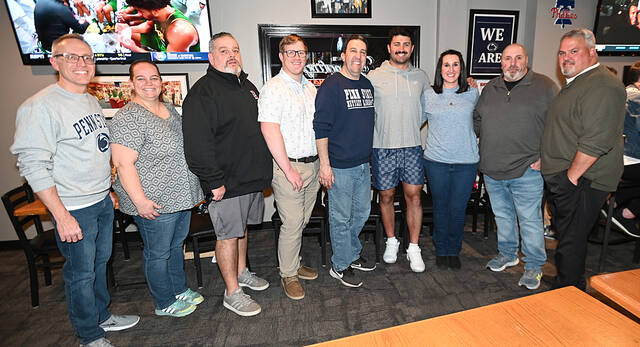 131366441_web1_GPSS-DeLuca-Signing-5
Members of the Greater Pittston Santa Squad attended the fundraiser at The Red Mill, Pittston, where Penn State football co-captain and West Pittston native Dominic DeLuca signed autographs and donated all of the proceeds to the Santa Squad on Thursday.
Tony Callaio | For Sunday Dispatch
