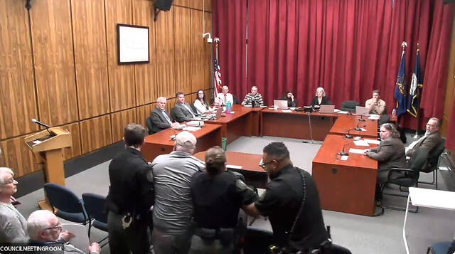 131381193_web1_zoom-joe-granteed
Joe Granteed is led out of Wednesdays county election board meeting by sheriff deputies.
Zoom screenshot