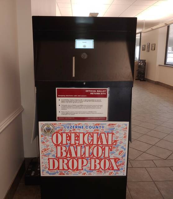 131411702_web1_dropbox5
Luzerne County Election Director Emily Cook publicly demonstrated the security features of this new mail ballot drop box Thursday as part of the county election boards upcoming decision on whether it will be used in a pilot program for the May 20 primary election.
Jennifer Learn-Andes | Times Leader