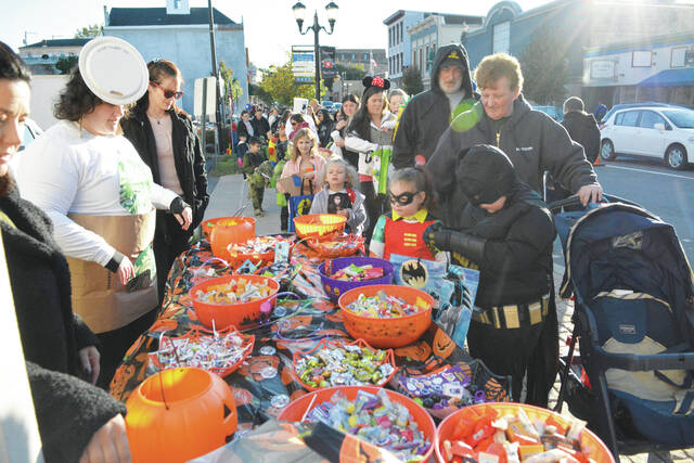 131434421_web1_PIttston-Preview-2025-3
Approximately 1,500 ghosts, princesses and super heroes lined Main St., downtown Pittston, in this file photo for the citys Trick or Treat Main Street Halloween. Trick or Treat Main Street will return in 2025.
Tony Callaio file | For Sunday Dispatch