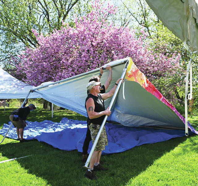 131485202_web1_WP-Cherry-Blossom-Big-Top-1
The crew at Big Top Rentals hoist a tent into position for the West PIttston Cherry Blossom Festival held this weekend.
Tony Callaio | For Sunday Dispatch