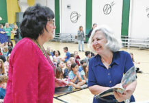 
			
				                                Wyoming Area Reading Specialist Caroline Flickinger, left, chats with old friend former Wyoming Area faculty member-turned-children’s author Lucille Colandro. Colandro was asked to read some of her award-winning books to the students of the Primary Center on Thursday, May 8.
                                 Tony Callaio | For Sunday Dispatch

			
		
