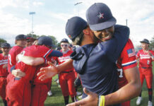 
			
				                                Pittston Area coach Paul Zaffuto hugs his pitcher Elijah Barr after winning the District 2 Class 5A championship Thursday afternoon 3-1 over Abington Heights.
                                 Fred Adams | For Times Leader

			
		