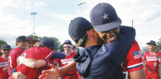 
			
				                                Pittston Area coach Paul Zaffuto hugs his pitcher Elijah Barr after winning the District 2 Class 5A championship Thursday afternoon 3-1 over Abington Heights.
 
			
		