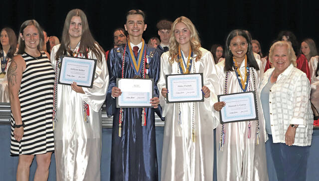 131567098_web1_Pittston-Kiwanis-PA-Scholarship
Presenting the Ron Faust Service Award from left to right: Brittani Shearer, Pittston Kiwanis president, Ashlynn Seldon, Jake Grzech, Hailey Pointek, Hannah Garcia, Mary Ann Faust (Rons wife).
Submitted photo