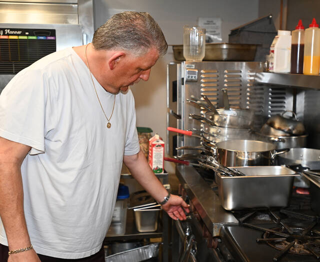 131597427_web1_Dante-s-Inferno-2
Dante LaFratte, a 40-year veteran of the food services industry, lights up the stove for the days orders at the Wyoming Hose Company #2, taking orders Wednesday through Saturday.
Tony Callaio | For Sunday Dispatch