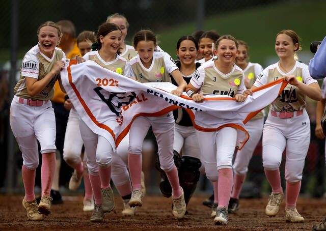 131611785_web1_gwa3_faa
The GWA players run the District 31 pennant around the Nanticoke Little League field after defeating Northwest 4-1 Friday night.
Fred Adams | For Times Leader