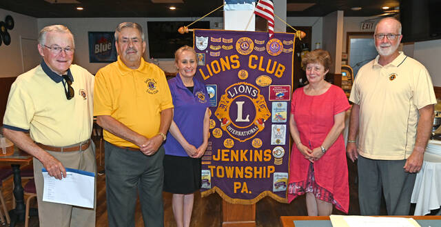 131612761_web1_Jenkins-Twp.-Lions-Installation-2
Newly installed officers of Jenkins Twp. Lions Club took the oath of office recently administered by Tom Huskey. From left: Huskey, Stan Rovinsky, president; Marlyn Querci and Rachel Rovinski as recording and corresponding secretaries; and Bob Linskey, treasurer.
Tony Callaio | Sunday Dispatch