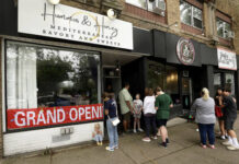 
			
				                                People line up out the door for Hummus & Honey’s grand opening on Saturday.
                                 Fred Adams | For Sunday Dispatch

			
		
