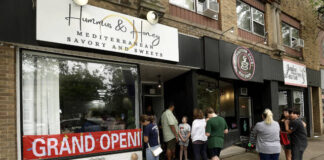 
			
				                                People line up out the door for Hummus & Honey’s grand opening on Saturday.
                                 Fred Adams | For Sunday Dispatch

			
		