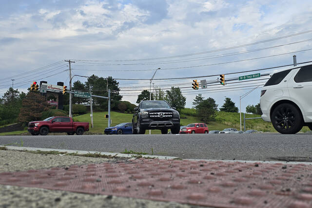 131636267_web1_RoadSafety1
Traffic moves at the intersection of Wilkes-Barre Twp. Boulevard and Coal Street/Highland Park Boulevard on Saturday evening.
Elizabeth Baumeister | Times Leader