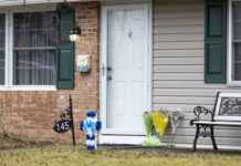 
			
				                                Flowers rest at the front door of the Mohn residence in Upper Orchard section of Levittown on Feb. 2, 2024.
                                 The Philadelphia Inquirer via AP, File

			
		