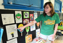 
			
				                                Cookie Corner teacher Miss Joan, points to the progress board on Jim Henson, the creator of The Muppets.
                                 Tony Callaio | For Sunday Dispatch

			
		