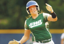 
			
				                                GWA’s Gianna Fattorusso sets to slide into third base after hitting a triple against Cornwall (New York) in the first inning of play at Wilkes University.
                                 Fred Adams | For Times Leader

			
		