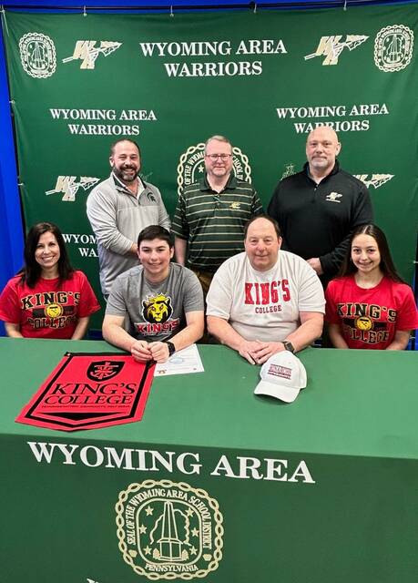 131672934_web1_BelzaSigning
Mario Belza, one of the leaders of a winning Wyoming Area golf team, has committed to Kings College to continue his academic and athletic careers. As a senior, Belza tied for fourth in the annual Tom Tryba Tournament and came within a playoff of reaching the District 2 Class 3A individual tournament. From left, first row: Jay Belza, Mario Belza, Rob Belza and Nina Belza. Second row: Joe Pizano, Wyoming Area athletic director; Gordon Williams, golf coach; and Eric Speece, principal.