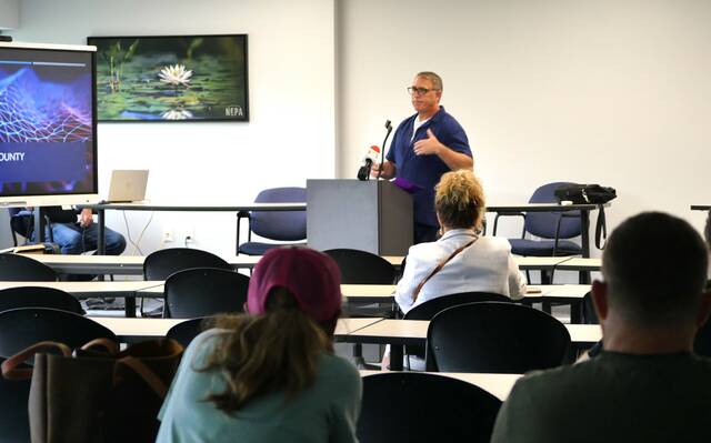 131681162_web1_ai-photo
Luzerne County Chief Artificial Intelligence Officer and First Assistant Solicitor Vito DeLuca briefs citizens on the countys developing AI program during a Wednesday night town hall at the county Operations Building in Wyoming.
Jennifer Learn-Andes | Times Leader