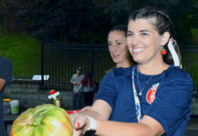 
			
				                                Jennifer Lombardo, left, looks on as Sarah Donahue, both of the Tomato Festival Committee, display the largest home-grown tomato entered in the annual tomato contest. Tony Callaio | For Sunday Dispatch
                                 Tony Callaio file photo | For Sunday Dispatch

			
		