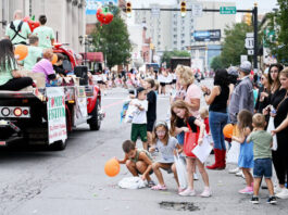 
			
				                                What would the parade be without children picking up tossed candy along the route, as shown here in 2024?
                                 Tony Callaio file photo | For Sunday Dispatch

			
		