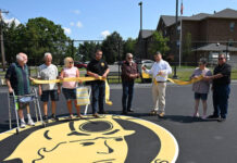 
			
				                                Cutting the ribbon for the Dupont basketball court is Dupont Councilman Stanley Knick, Jr. Left to right: Bob Price, council, Joseph Karkut, council, Danielle Perrins, court designer, Joseph Jones, council, Knick, PA State Rep. Jim Haddock, Dupont Mayor Elaine Lello, Luzerne Co. Judge Fred A. Pierantoni, III.
                                 Tony Callaio | For Sunday Dispatch

			
		