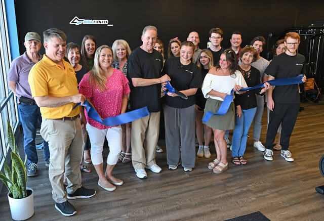 131702853_web1_Aira-Fitness-Opening-1
Jim DeMichele, owner of Aira Fitness, along with his daughter Ava, cut the ribbon on the 24/7 fitness center at the Pittston Crossings, 320 Highway 315, located next to Primo Hoagies, on Friday.
Tony Callaio | For Sunday Dispatch