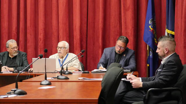 131721855_web1_ethics
Luzerne Countys Ethics Commission voted Monday to seek county council approval for an ethics code change so two ethics complaints from June can be unsealed and processed. Commission members in attendance included, from left, county Administrative Services Division Head Jim Rose (the county managers designee), county Controller Walter Griffith and citizen Ben Herring. Commission Solicitor William Lawrence is seated at right.
Jennifer Learn-Andes | Times Leader