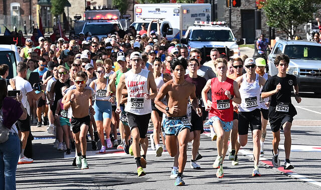 131735153_web1_2025-Tomato-Fest-5K-1
Over 200 runners and walkers take off at the starting line counted down by Pittston Mayor Michael Lombardo for the annual Pittston Tomato Festival 5K Walk & Race on Saturday.