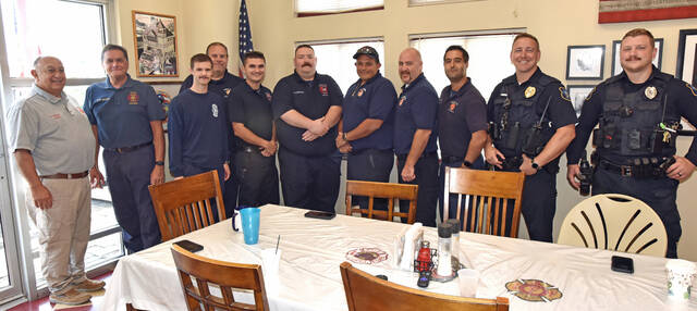 131776557_web1_2nd-Presb-911-Bkfast-1
Some members of fire, ambulance and police departments in the Pittston area were treated to a 9/11 breakfast by the members of the Second Presbyterian Church, Pittston. From left: Pittston Fire Chief Frank D Roman, Laflin Chief Marc Malvizzi, firefighter Joe Boos, Assistant Chief John Ankenbrand, firefighter Drew Malvizzi, firefighter Joe Homer Corcoran, Assistant Chief Tony Angelella, firefighter Mike Pehonich, firefighter John Lombardo, Pittston Police Chief Kyle Shumosic and Patrolman Jake Wesolowski.
Tony Callaio | For Sunday Dispatch