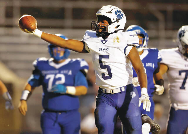 131805831_web1_ber_han3_faa
Berwick running back TyMeere Wilkerson holds the ball up after one of his five touchdowns against Hanover Area last Friday. Wilkerson leads the entire Wyoming Valley Conference in rushing and scoring.
Fred Adams | For Times Leader
