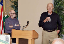 
			
				                                Ronald Rogers, right, leads the West Pittston all-class reunion held at Fox Hill Country Club in singing the school’s alma mater with Craig Robertson looking on.
                                 Tony Callaio | For Sunday Dispatch

			
		
