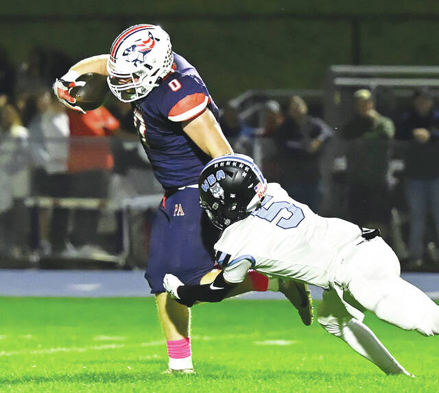 131829193_web1_PA-WBA-Ftbl-1
Pittston Area running back Brody Spindler (0) is breaks away from the last Wilkes-Barre Area defender, Rajan Watson (5), to score a 44-yard touchdown on a fake punt.
Tony Callaio | For Times Leader