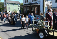 
			
				                                The Mother of the Rosary Procession, a walk taking place for over 100-years, travels west on Pine Street Pittston in 2024.
                                 Tony Callaio file photo | For Sunday Dispatch

			
		