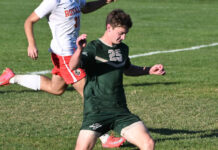 
			
				                                It was a mad scramble near Wyoming Area’s goal as the Warriors’ Jonas Kremski (25) got to the ball just a little late before Redeemer goalie Max Mohutsky.
                                 Tony Callaio | For Sunday Dispatch

			
		