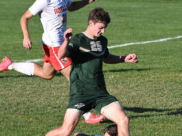
			
				                                It was a mad scramble near Wyoming Area’s goal as the Warriors’ Jonas Kremski (25) got to the ball just a little late before Redeemer goalie Max Mohutsky.
                                 Tony Callaio | For Sunday Dispatch

			
		