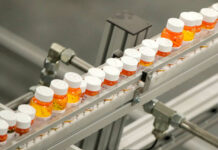 
			
				                                Bottles of medicine ride on a conveyor belt at a mail-in pharmacy warehouse in Florence, N.J., on July 10, 2018.
                                 AP File Photo

			
		