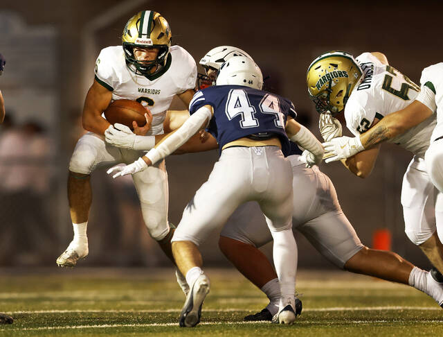 131859892_web1_ber_wy2_faa
Wyoming Area quarterback Jack Gravine keeps the ball in the first quarter against Berwick. - Fred Adams | For Times Leader
Fred Adams | For Times Leader 9-26-25