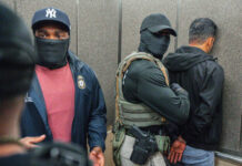 
			
				                                FILE - Immigration and Customs Enforcement agents escort a detained immigrant into an elevator after he exited an immigration courtroom, June 17, 2025, in New York. (AP Photo/Olga Fedorova, file)
                                 AP File Photo

			
		