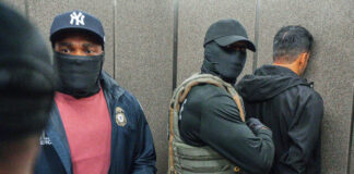 
			
				                                FILE - Immigration and Customs Enforcement agents escort a detained immigrant into an elevator after he exited an immigration courtroom, June 17, 2025, in New York. (AP Photo/Olga Fedorova, file)
                                 AP File Photo

			
		