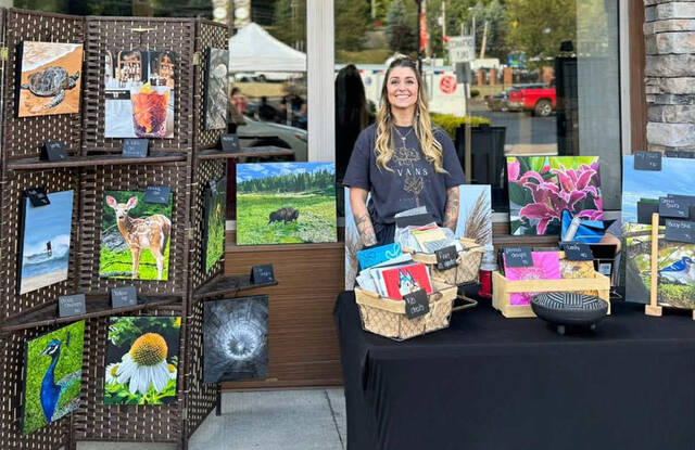 131864081_web1_Leandra-Hetro
Leandra Hetro stands at her booth during one of Pittstons Second Friday Artwalks. Her artwork will be exhibited at Art e Fekts Gallery, Pittston, from 5 p.m. to 7 p.m. Friday, Oct. 24.
Submitted photo