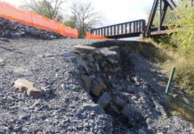 
			
				                                Erosion inching toward part of the Wyoming Valley Levee system flood wall along Riverside Drive in Wilkes-Barre is concerning enough to seek an immediate outside engineer assessment, Luzerne County’s Flood Protection Authority decided Tuesday. The flood wall is behind the orange netting.
                                 Jennifer Learn-Andes | Times Leader

			
		