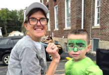 2nd Presbyterian holds trunk or treat 
			
				                                Heather DAnna paints Nico Davis face during trunk or treat at the Second Presbyterian Church, Pittston.
                                 Submitted photo