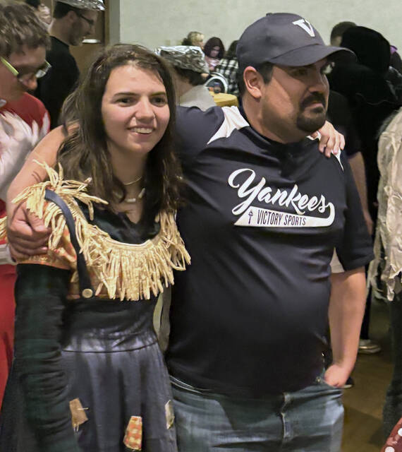 131880919_web1_Victory-Sports-Halloween-1 
			
				                                Freddie King, left, and her boyfriend, Steven Wickersheim, listen to live music provided by Richie Kossuth and Brandon Jopling during the Victory Sports Halloween dance.
                                 Tony Callaio | For Sunday Dispatch
