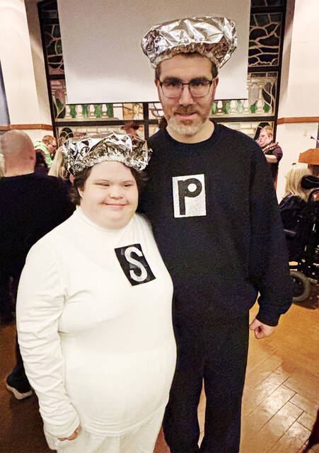 <p>Mallory Hughes and Gerard Wazeter dressed as salt and pepper shakers for the Victory Sports Halloween party on Tuesday, Oct. 21.</p>
                                 <p>Tony Callaio | For Sunday Dispatch</p>