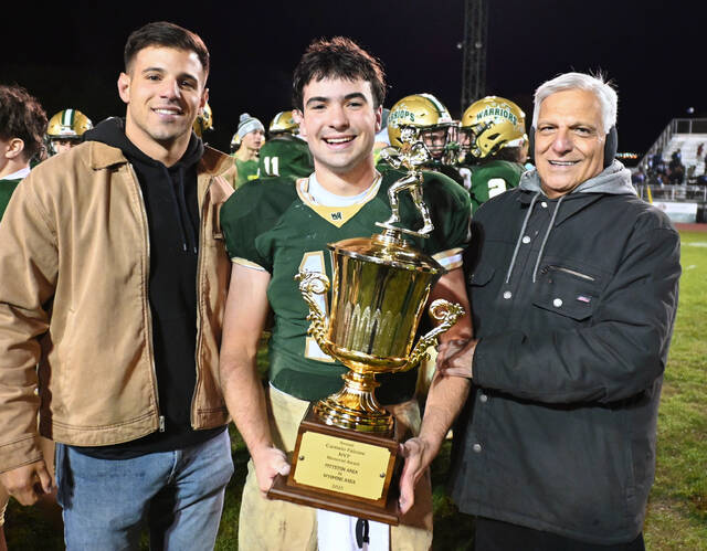 131882667_web1_Falcone-Award-Ciampi 
			
				                                The Wyoming Area/Pittston Area rival football game MVP went to Warrior Nick Ciampi. From left are: Sam Falcone, Ciampi, and Camen Falcone, handing over the Carmelo Falcone MVP Memorial Award.
                                 Tony Callaio | For Sunday Dispatch